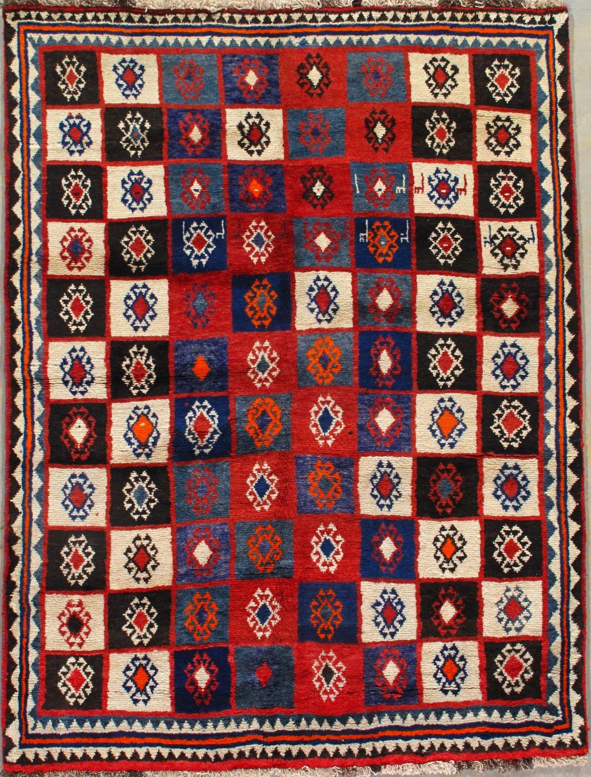 A rug that has a checkered pattern on it