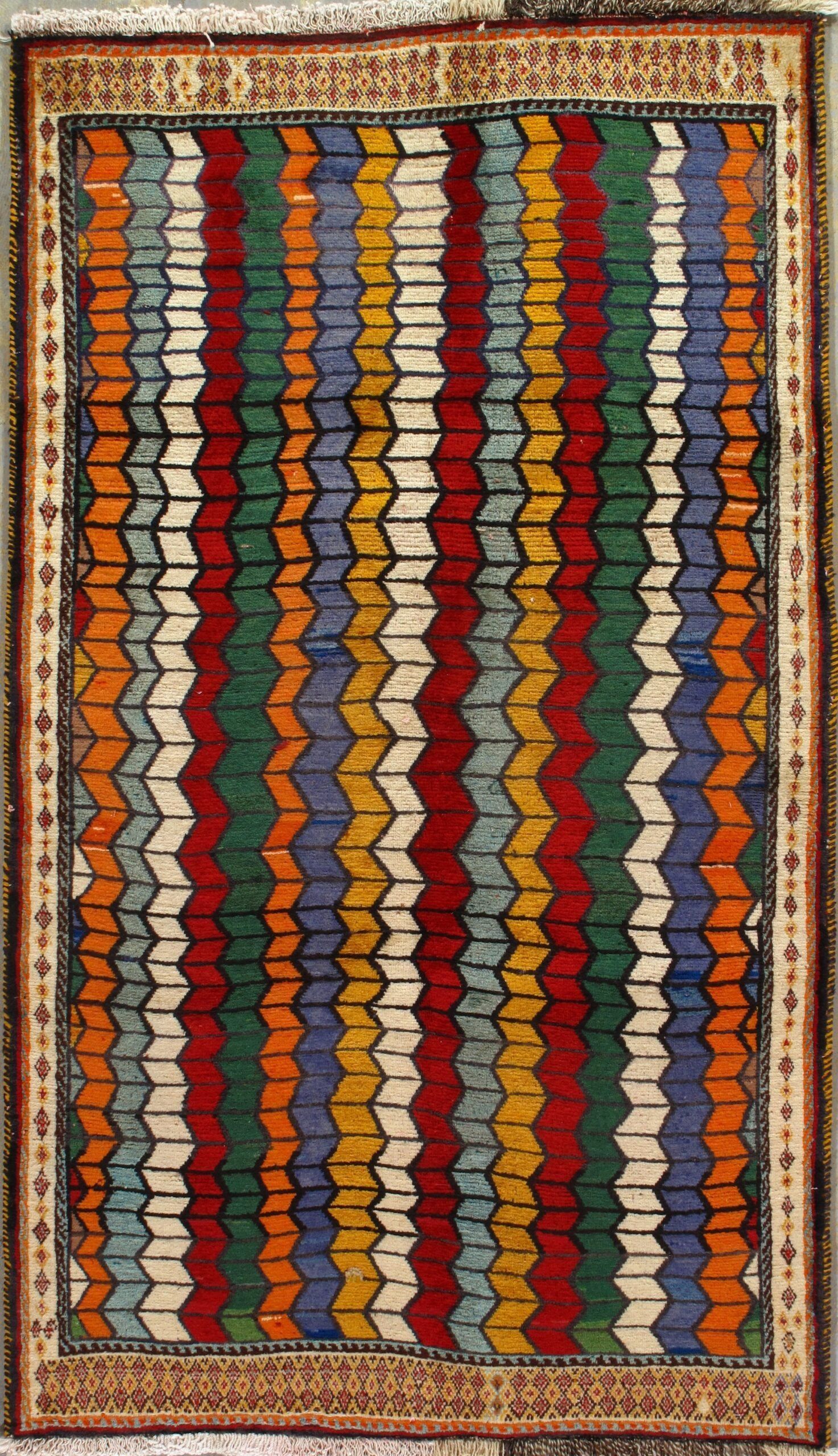 A colorful rug with a geometric pattern on it
