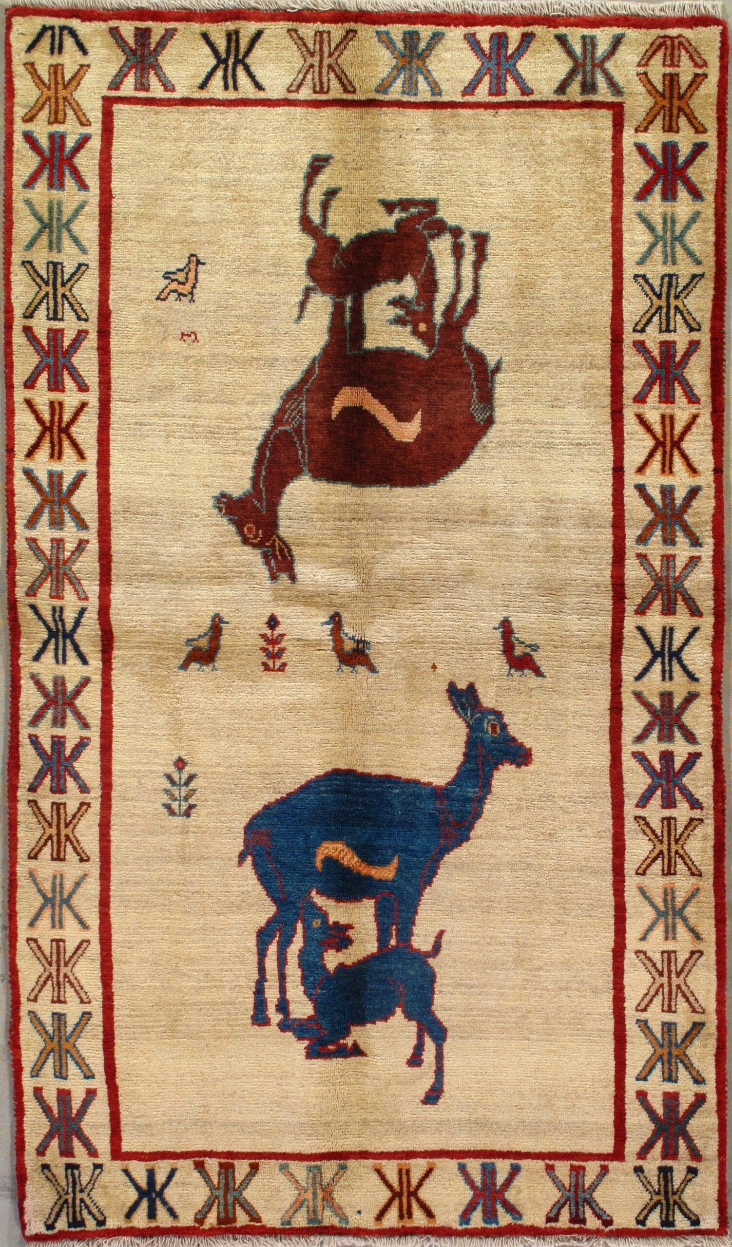 A rug with a picture of two deer on it.