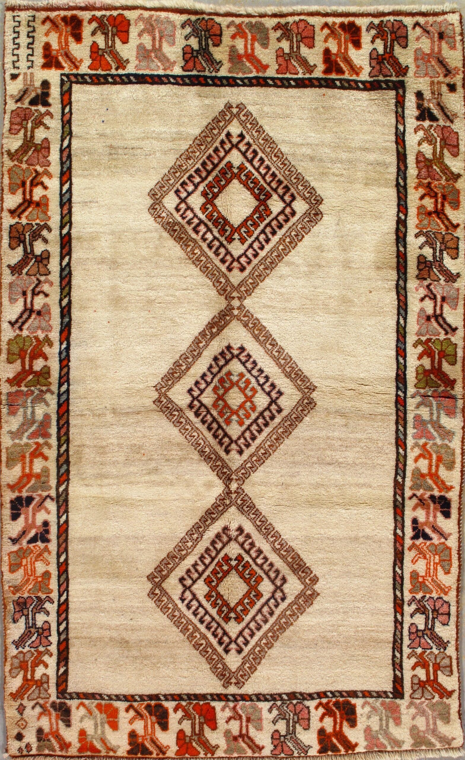 A rug with a geometric pattern on it is sitting on a table.