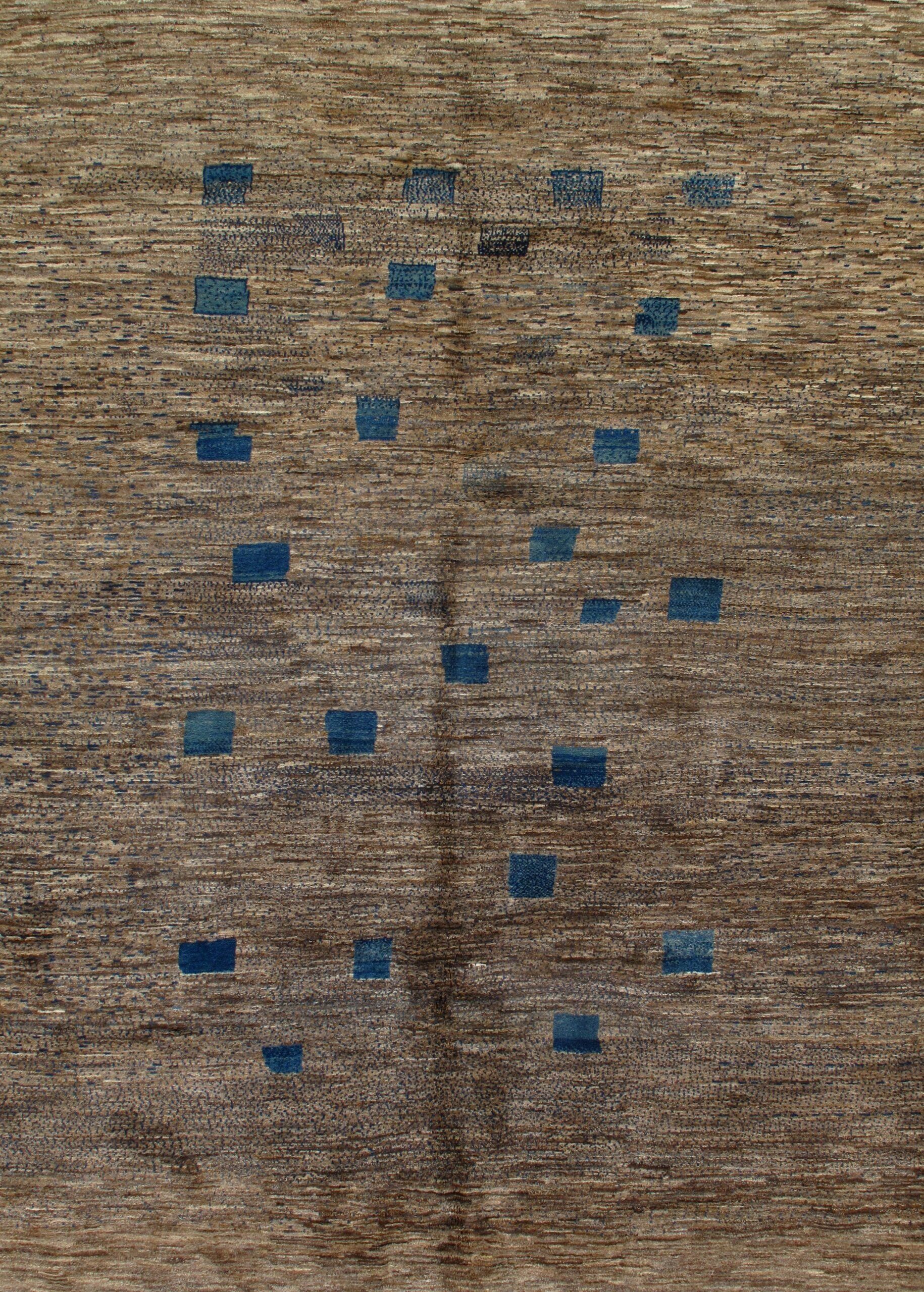 A close up of a brick wall with blue squares on it.