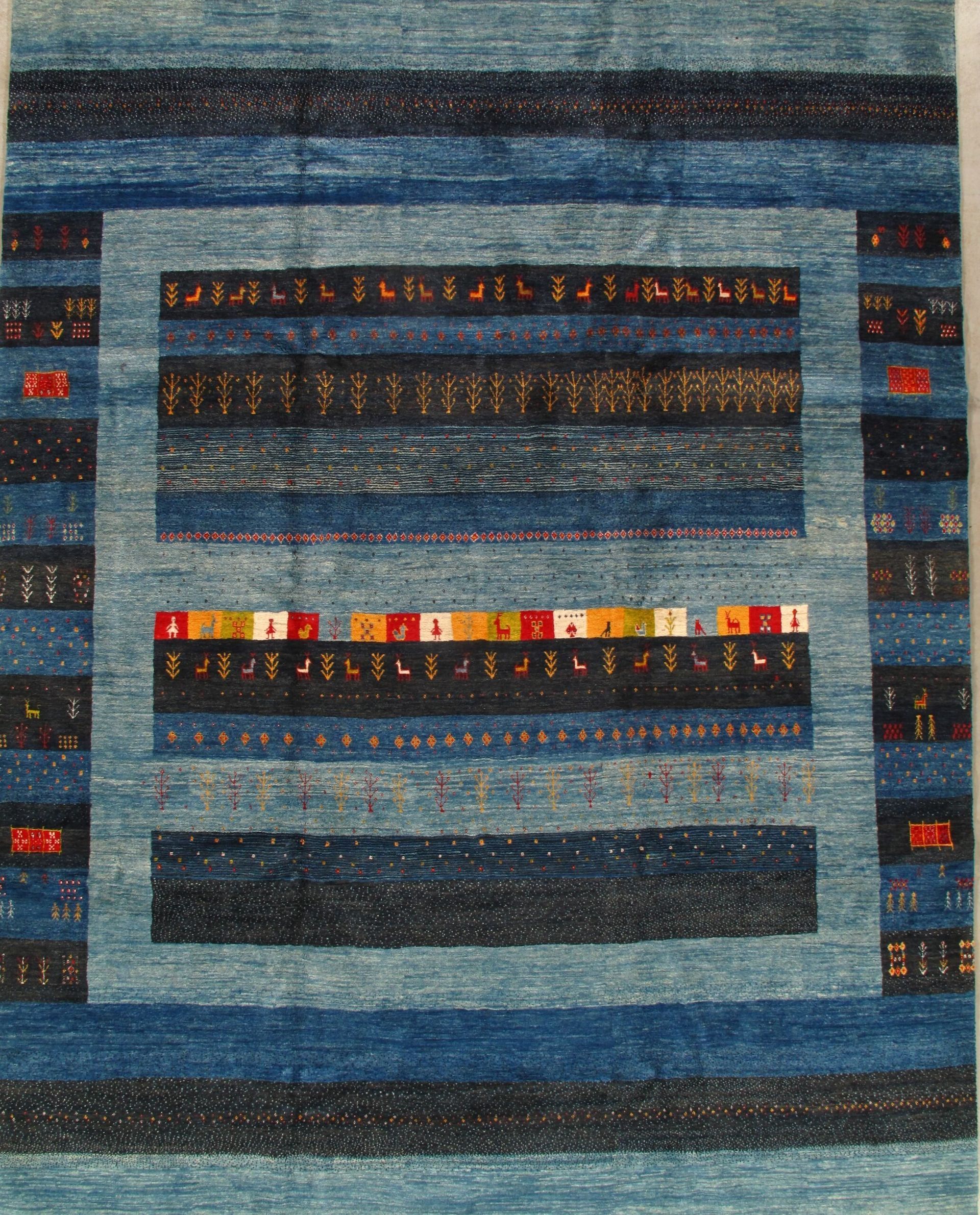 A blue rug with a geometric pattern on it