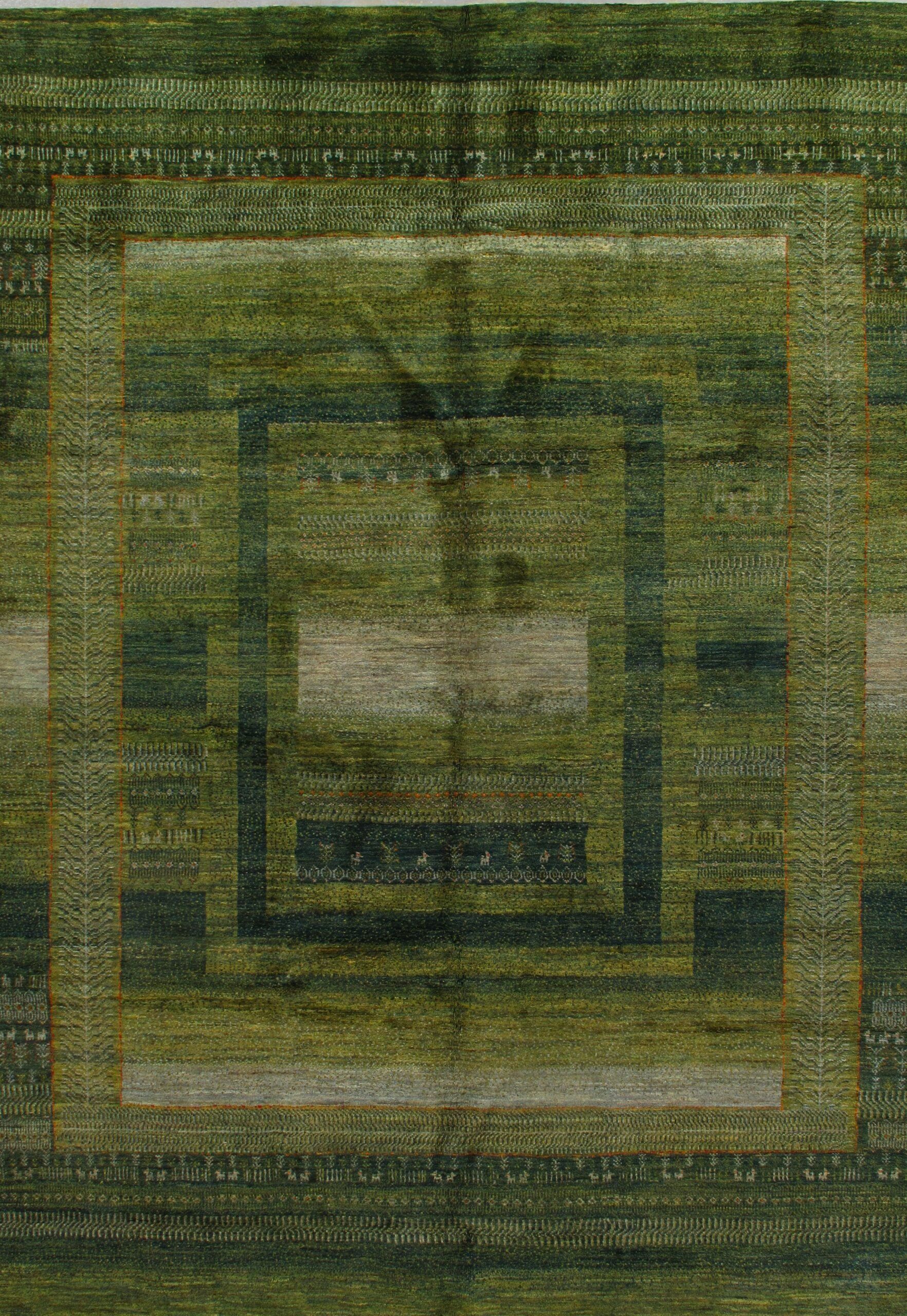 A green rug with a square pattern on it.