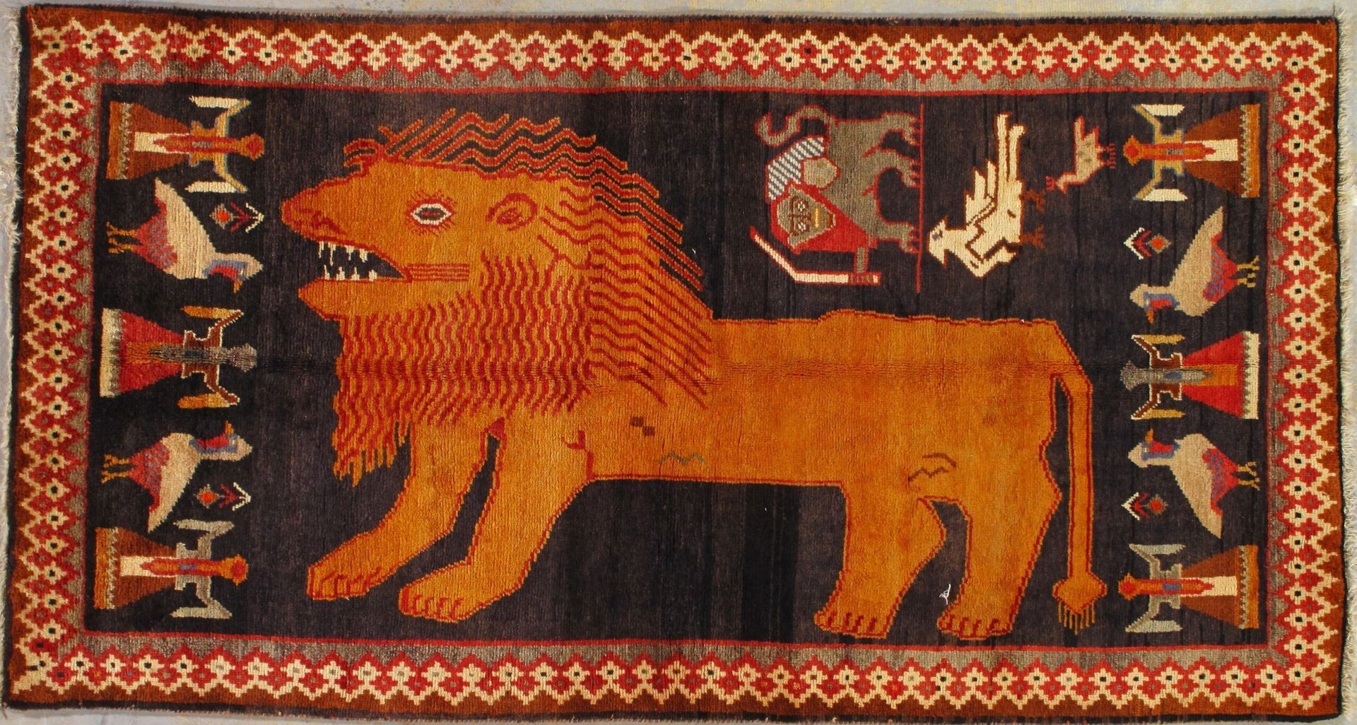 A rug with a picture of a lion on it
