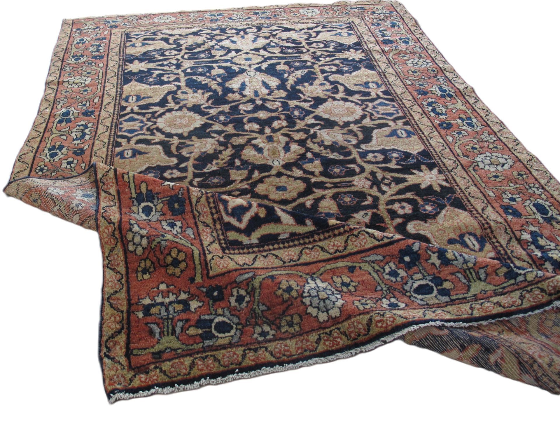 A rug with a floral pattern on it is on a white background