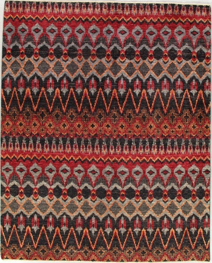A colorful rug with a geometric pattern on it