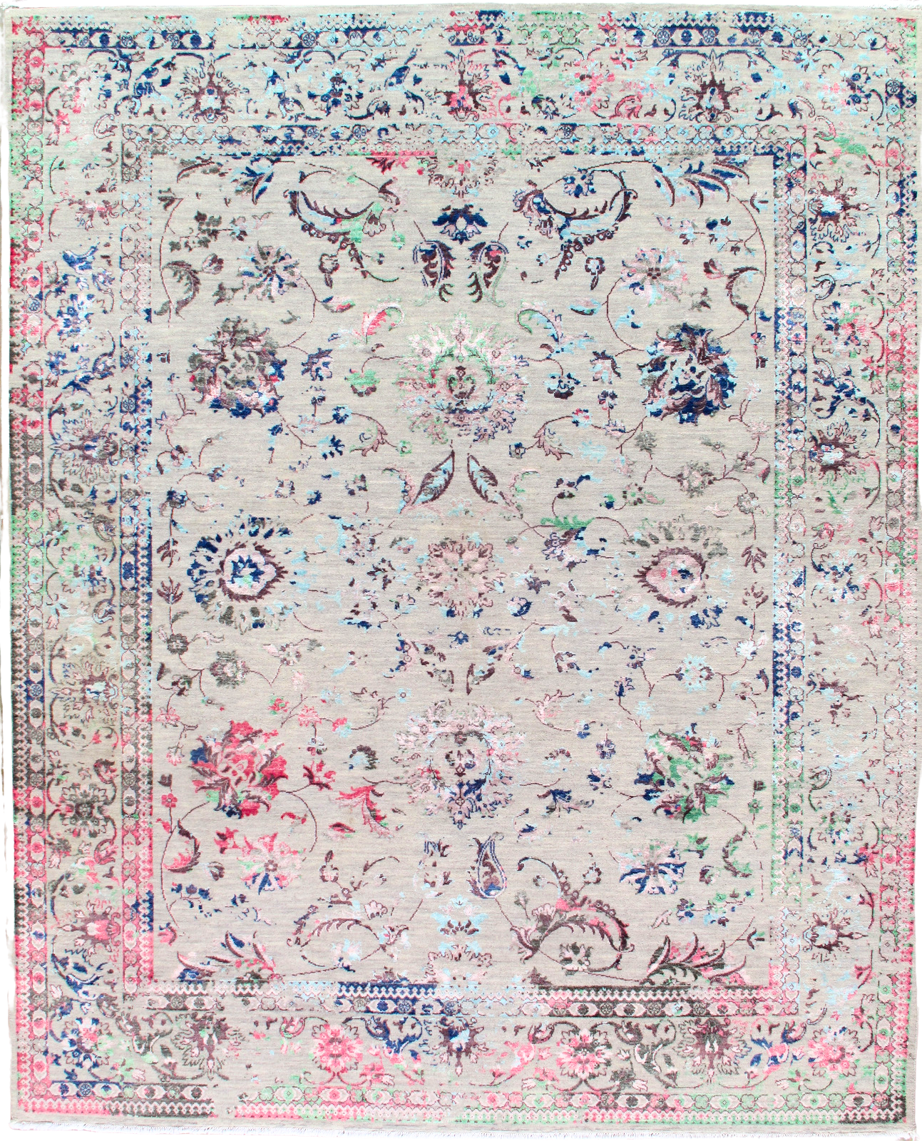 A white rug with a colorful pattern on it.