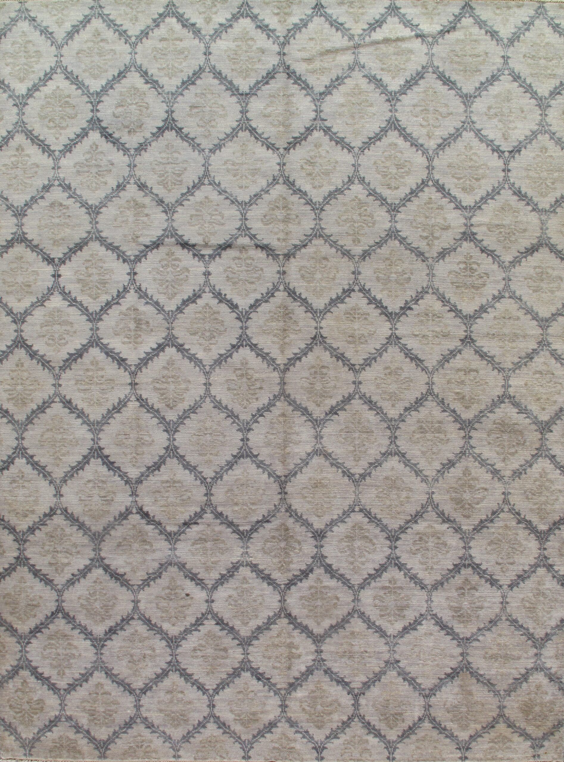 A close up of a rug with a pattern on it.