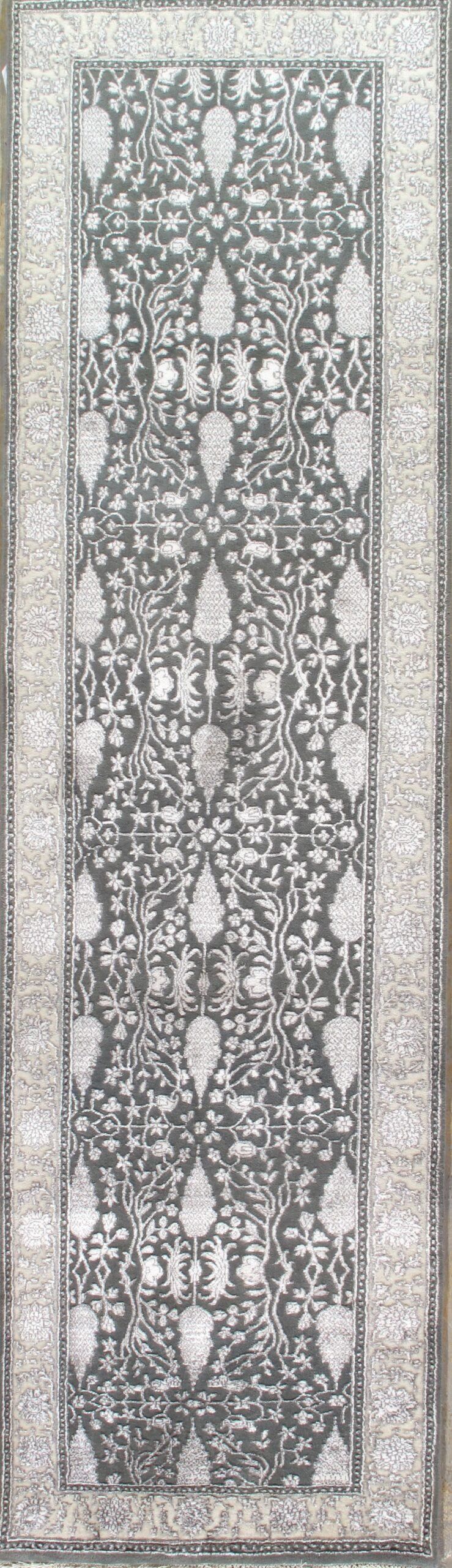 A black and white drawing of a rug with a pattern on it.