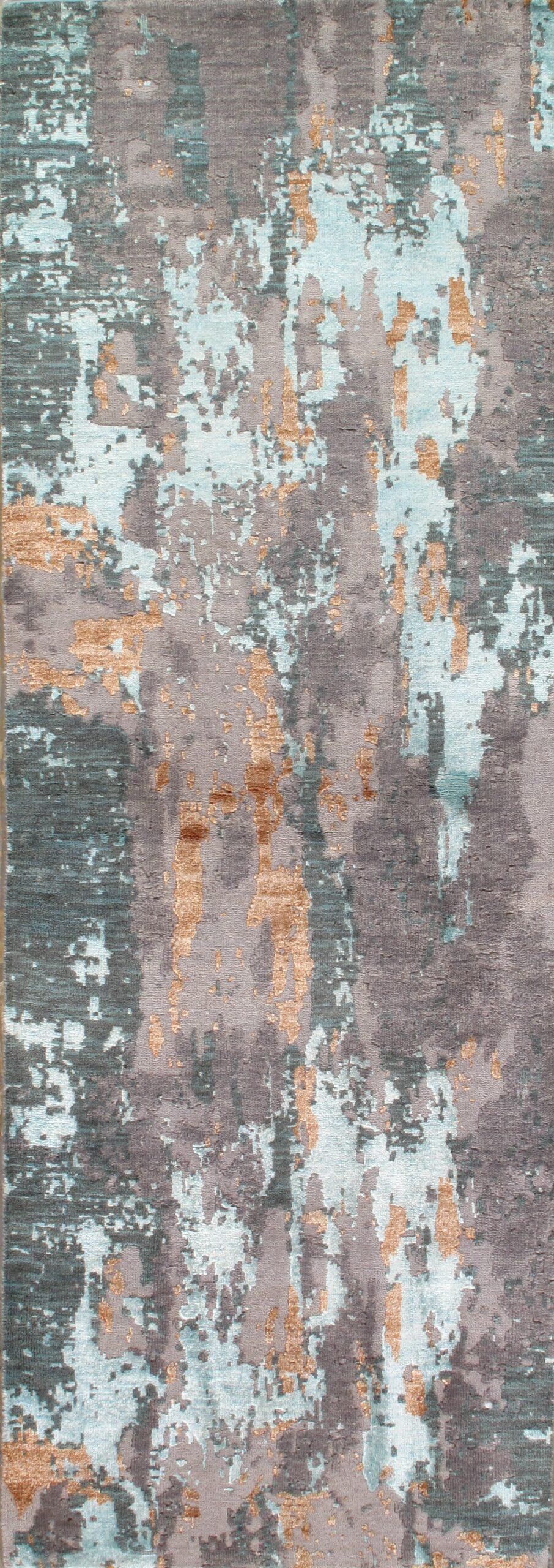 A close up of a rug with a painting on it.