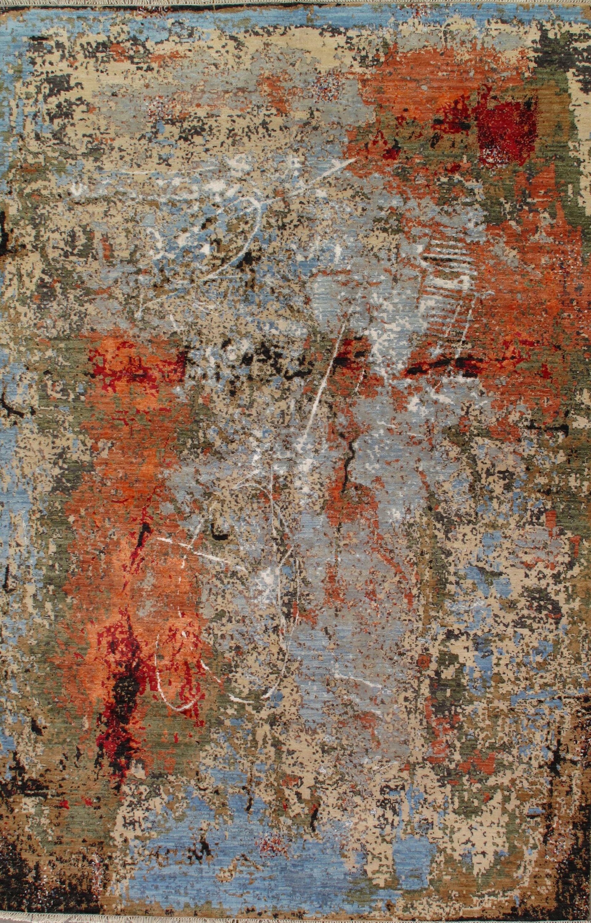 A close up of a colorful rug with a painting on it.