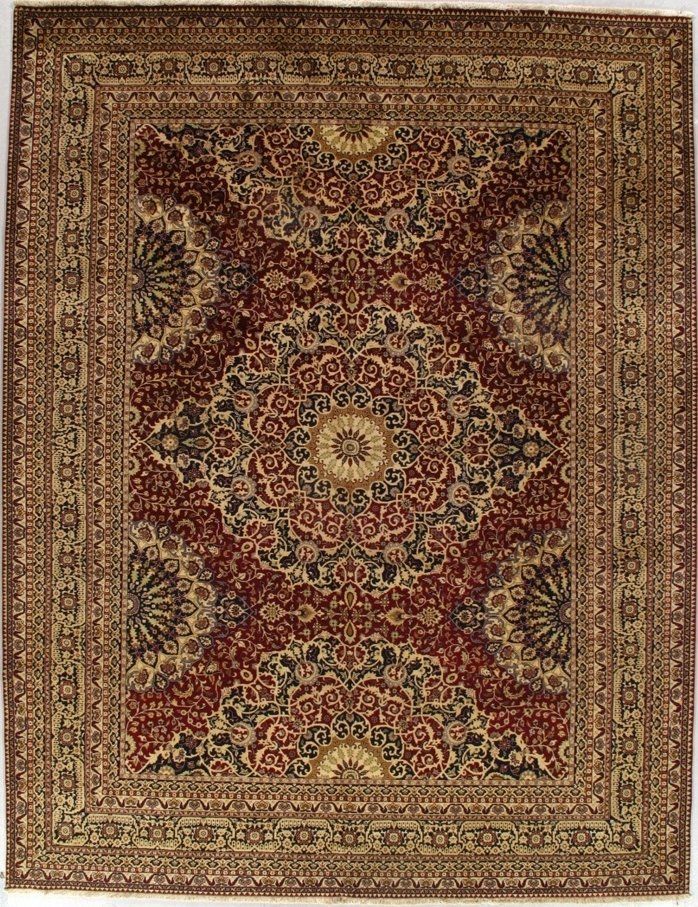 A red and gold rug with a floral pattern on a white background.