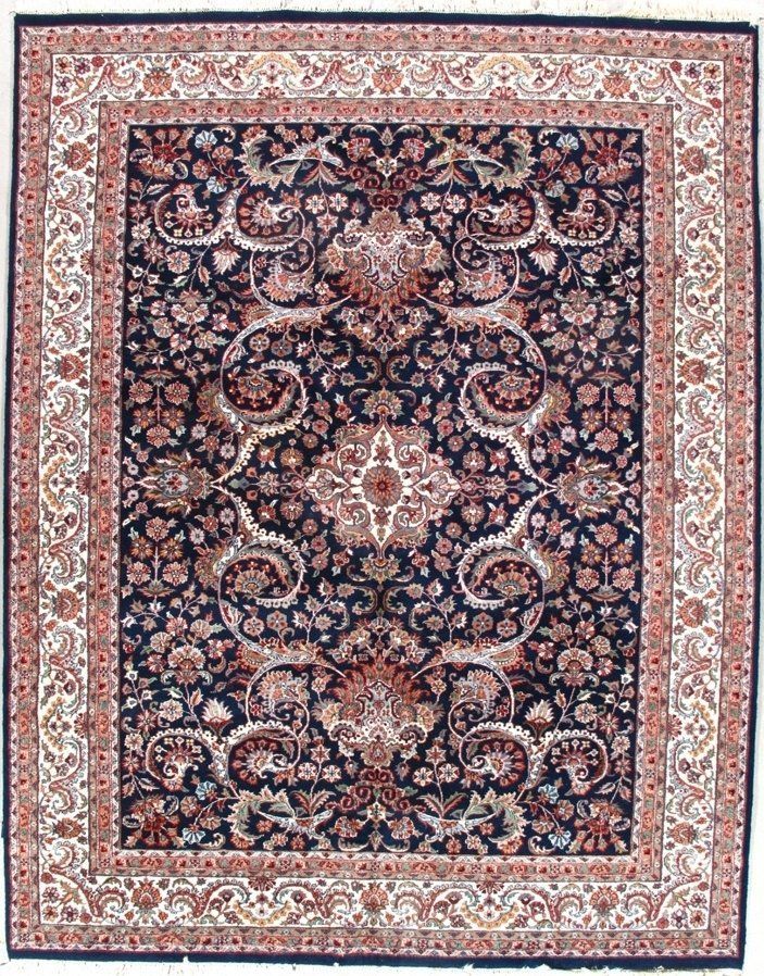 A rug with a floral pattern on it is on a white background.