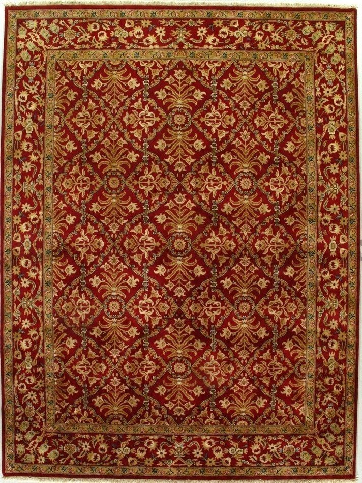 A red rug with a gold border on a white background.