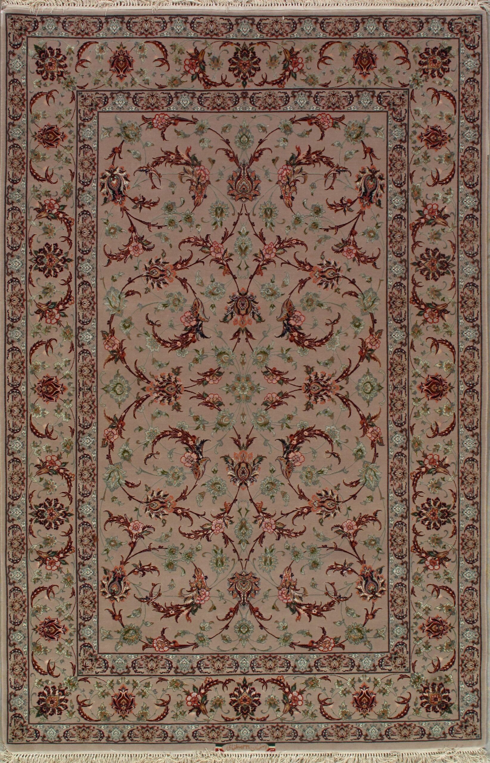 A rug with a floral pattern on it is sitting on a table.