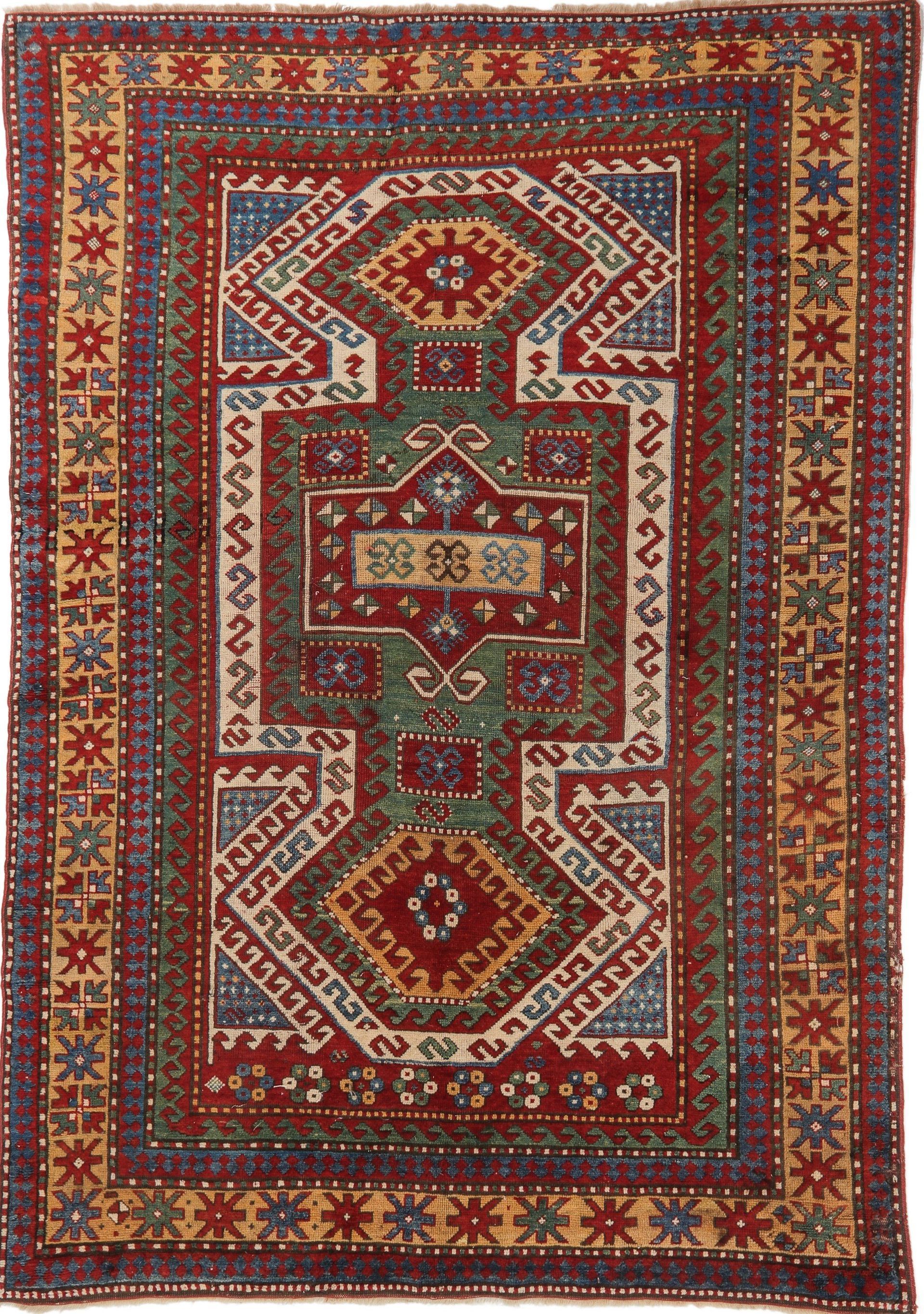A colorful rug with a geometric pattern on it