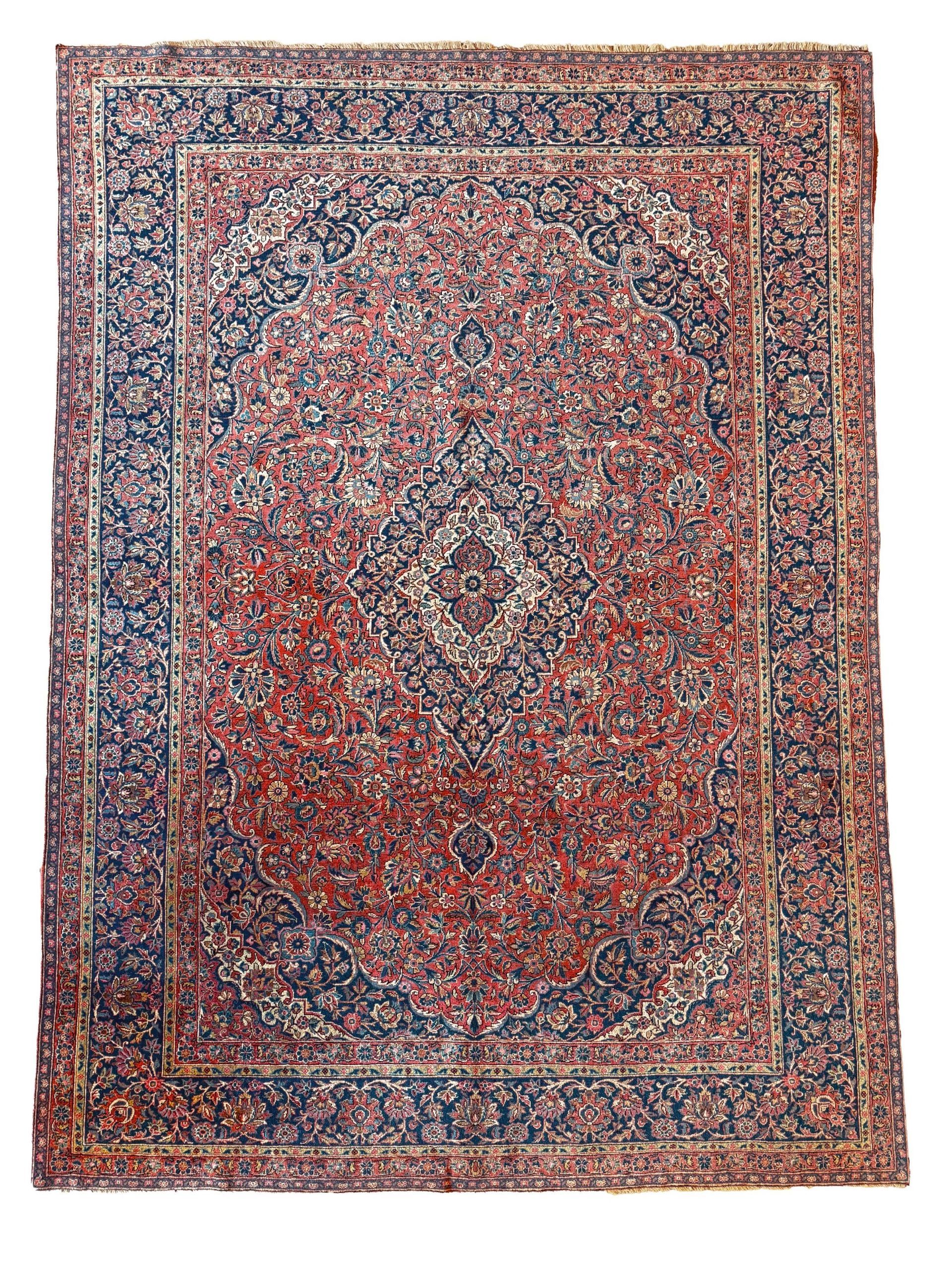 A rug with a pattern on it is on a white background.