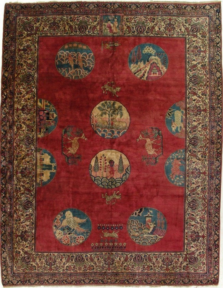 A red rug with circles and birds on it