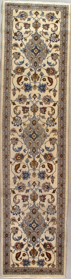A rug with a floral pattern on it is sitting on a table.