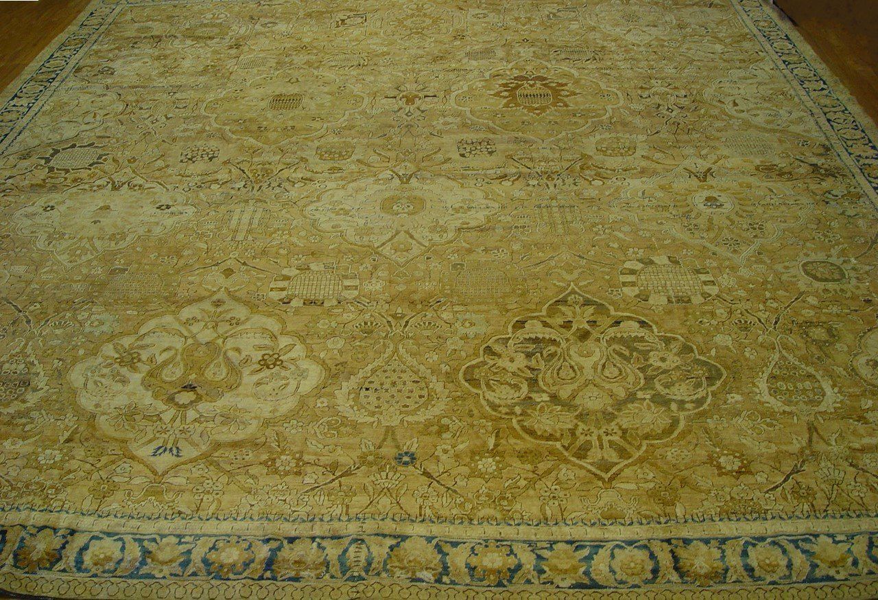 A close up of a rug with a floral pattern on it.