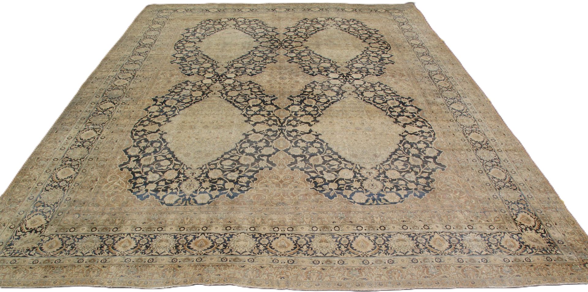 A close up of a rug with a circular pattern on it.