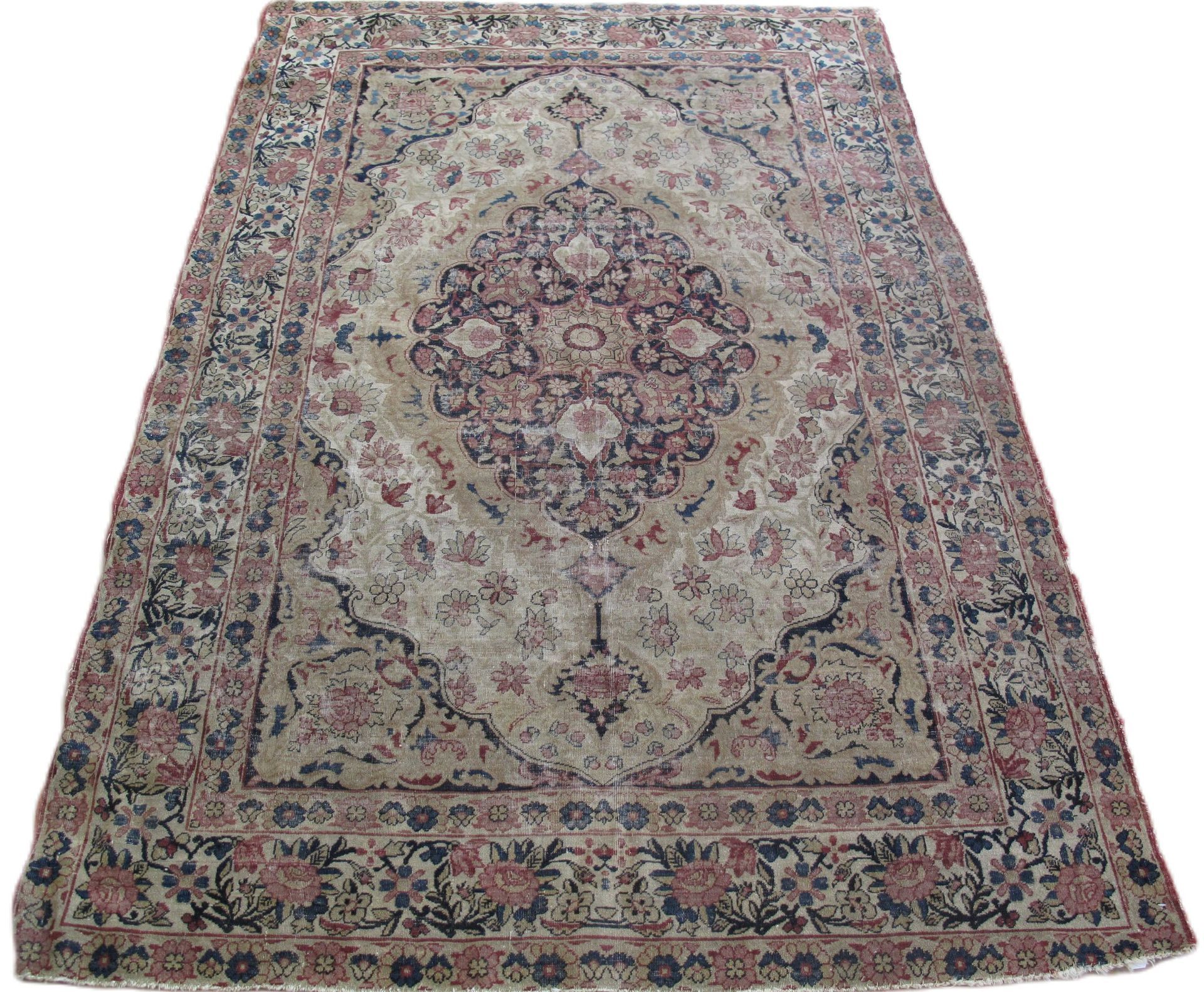 A rug that has a floral pattern on it