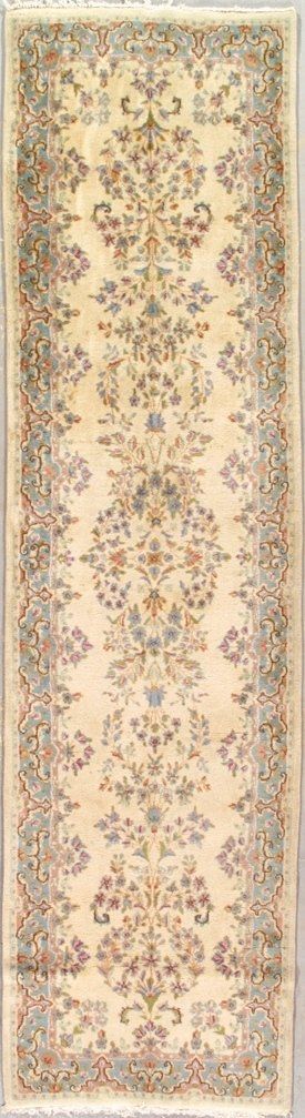 A rug with a floral pattern on it is sitting on a table.