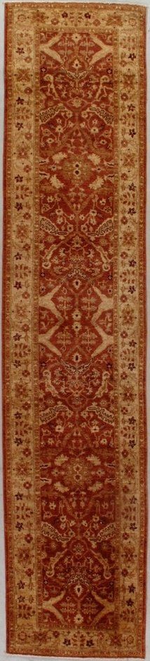 A brown rug with a geometric pattern on it