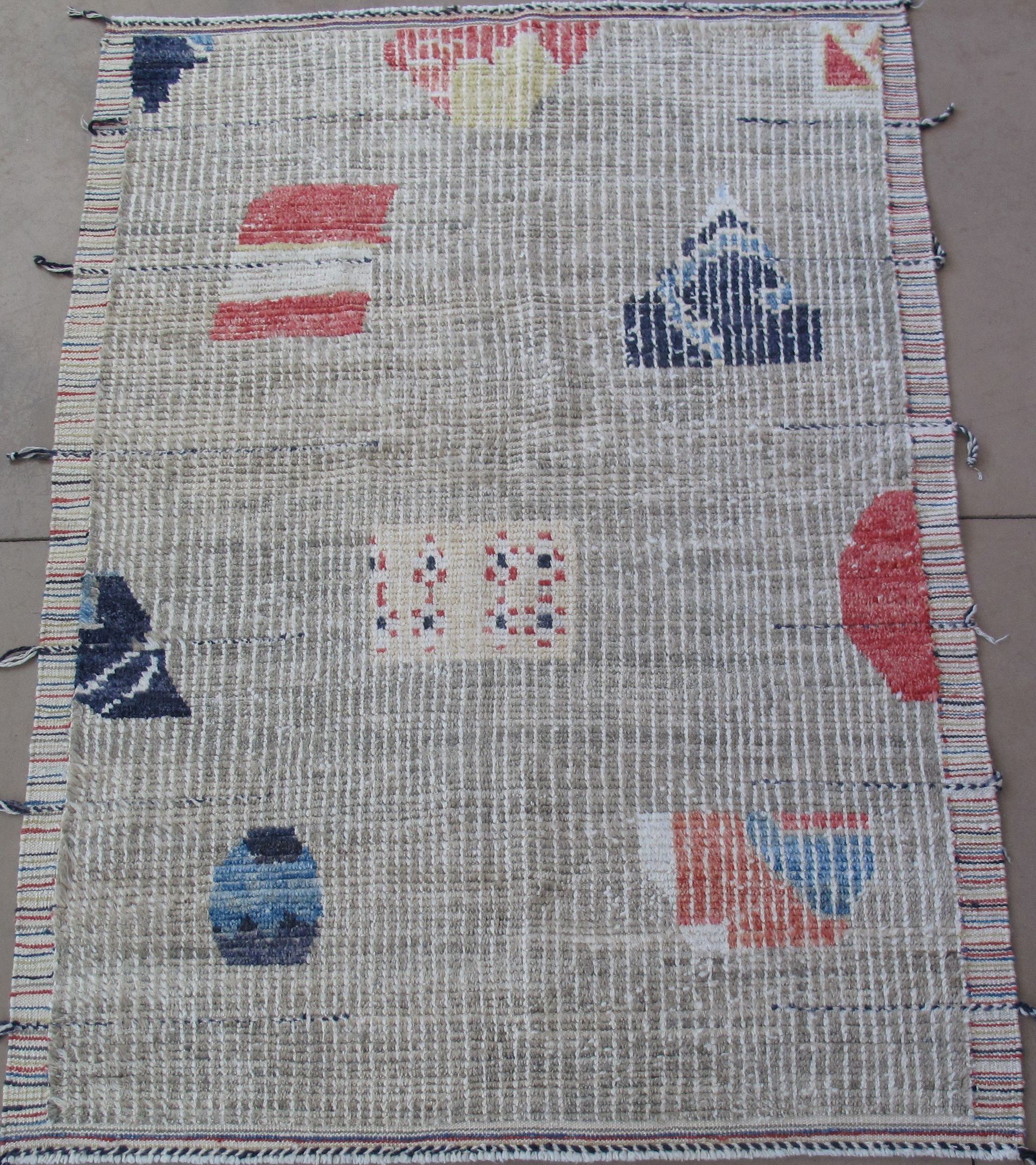 A rug with a pattern of playing cards on it
