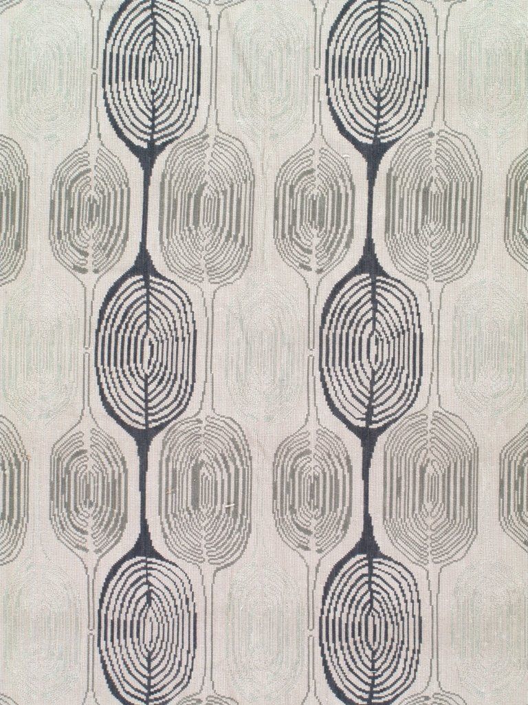 A close up of a fabric with a pattern of circles on it.