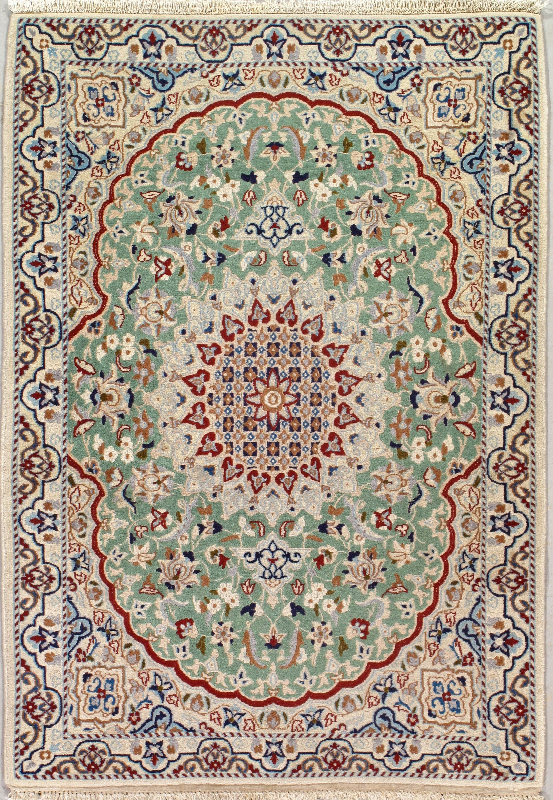 A rug with a floral pattern on it is on a white background.