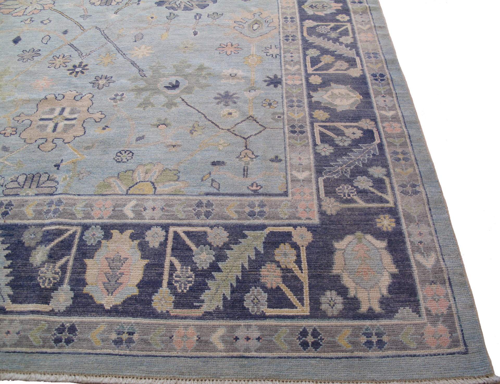 A rug with a border that says ' a ' on it