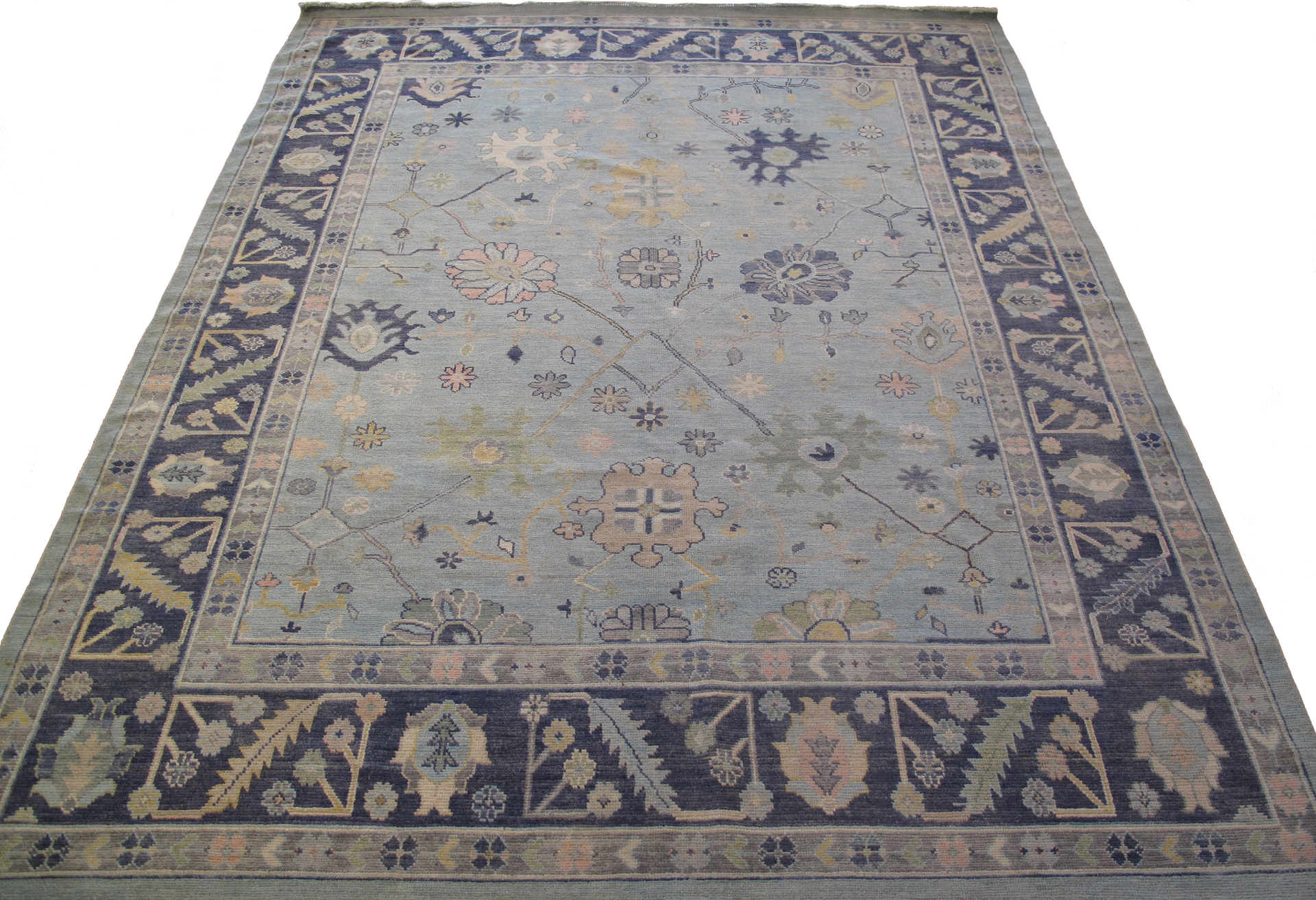 A rug with a border that says ' a ' on it