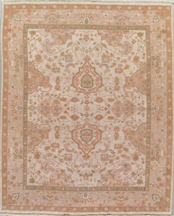 A rug with a floral pattern on it is sitting on a table.