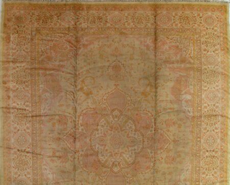 A rug with a floral pattern on it is sitting on a table.