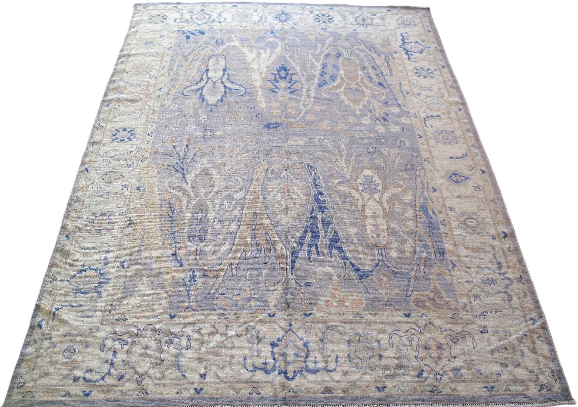 A rug with a blue and white pattern on it