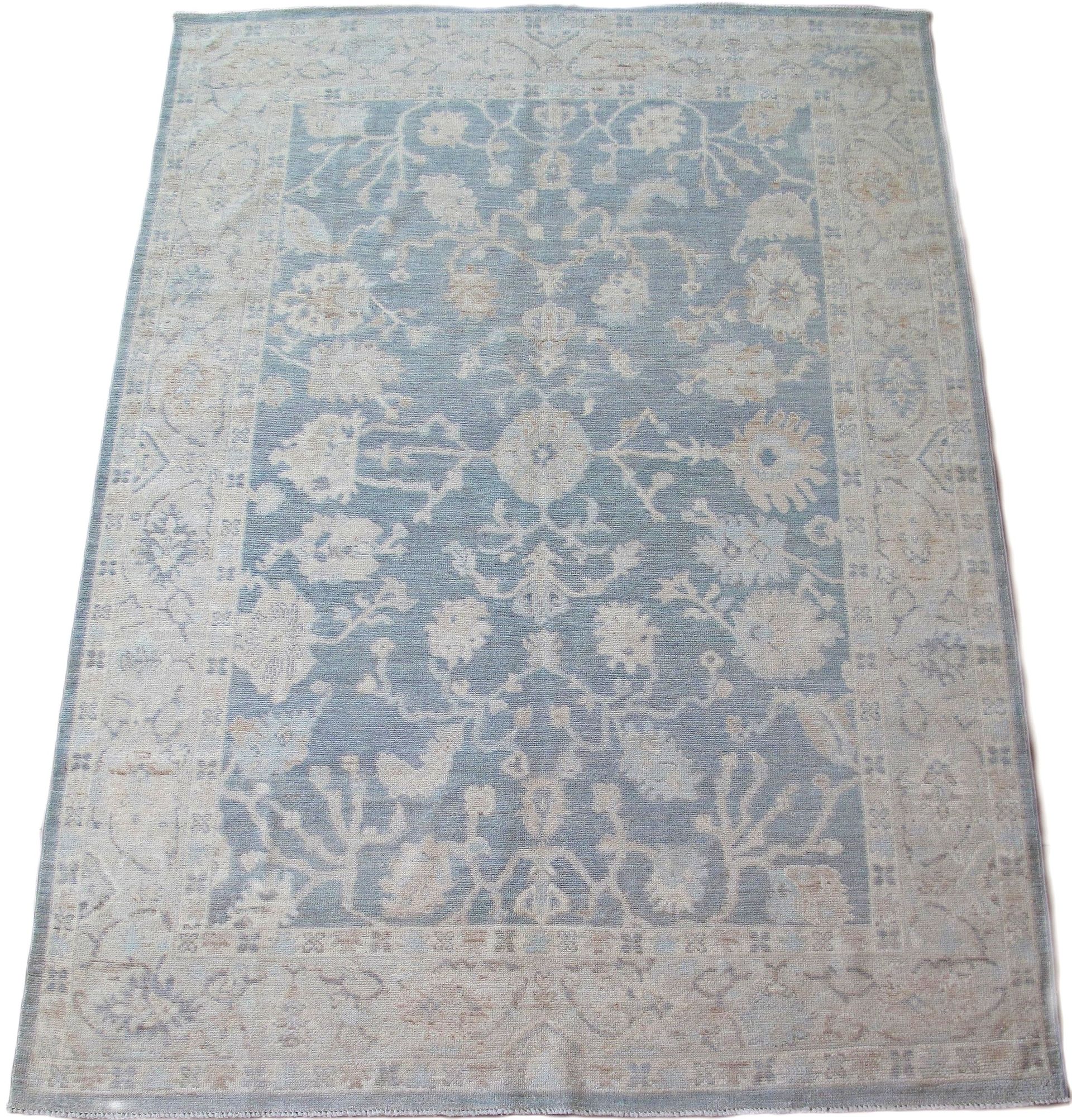A rug that has a floral pattern on it