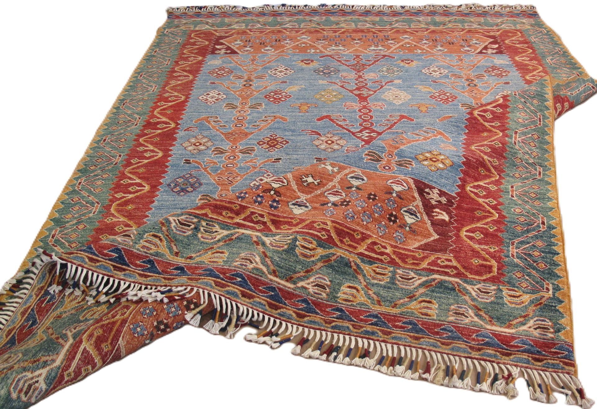 A rug with a tree design on it