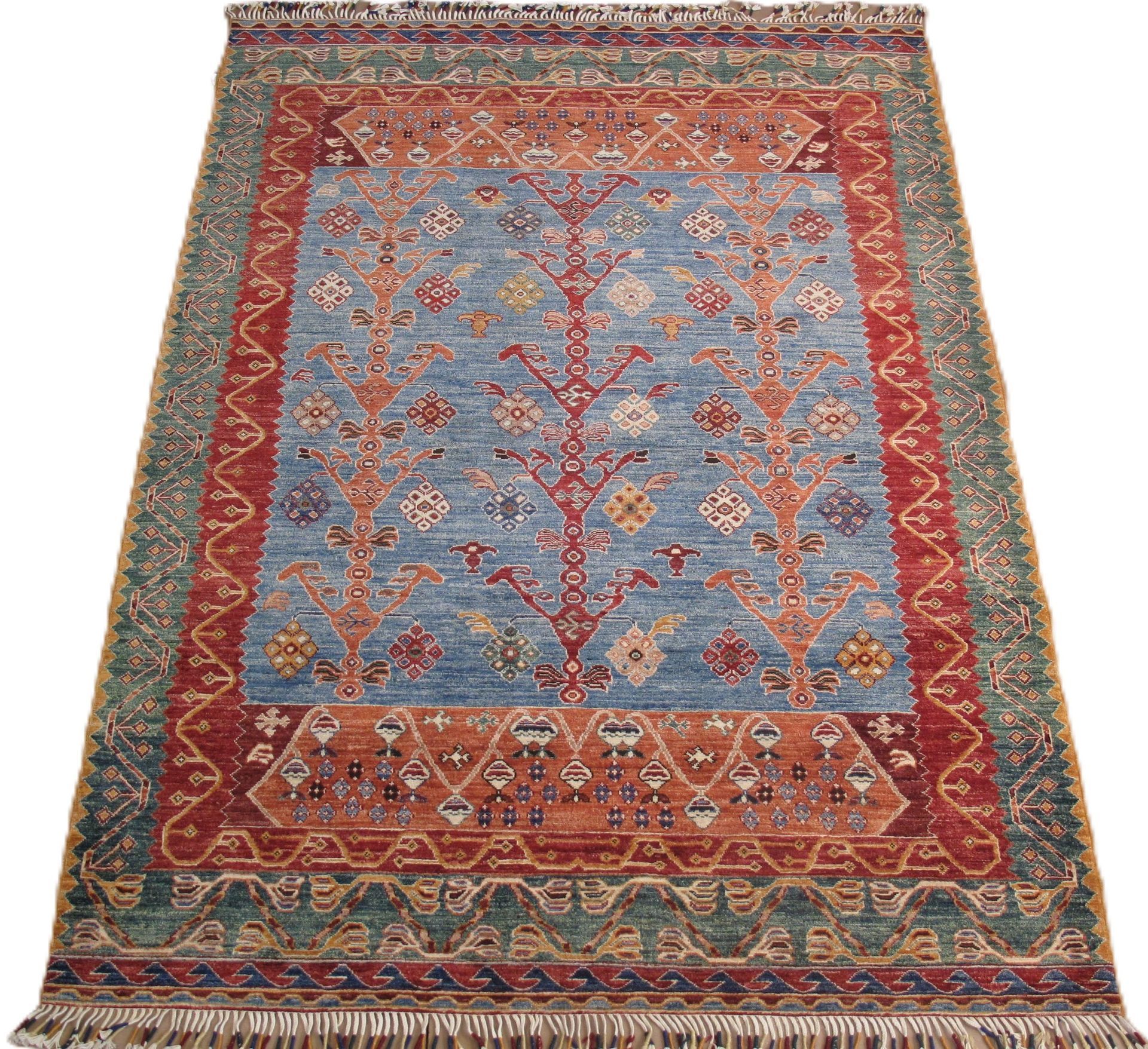 A rug with a tree design on it