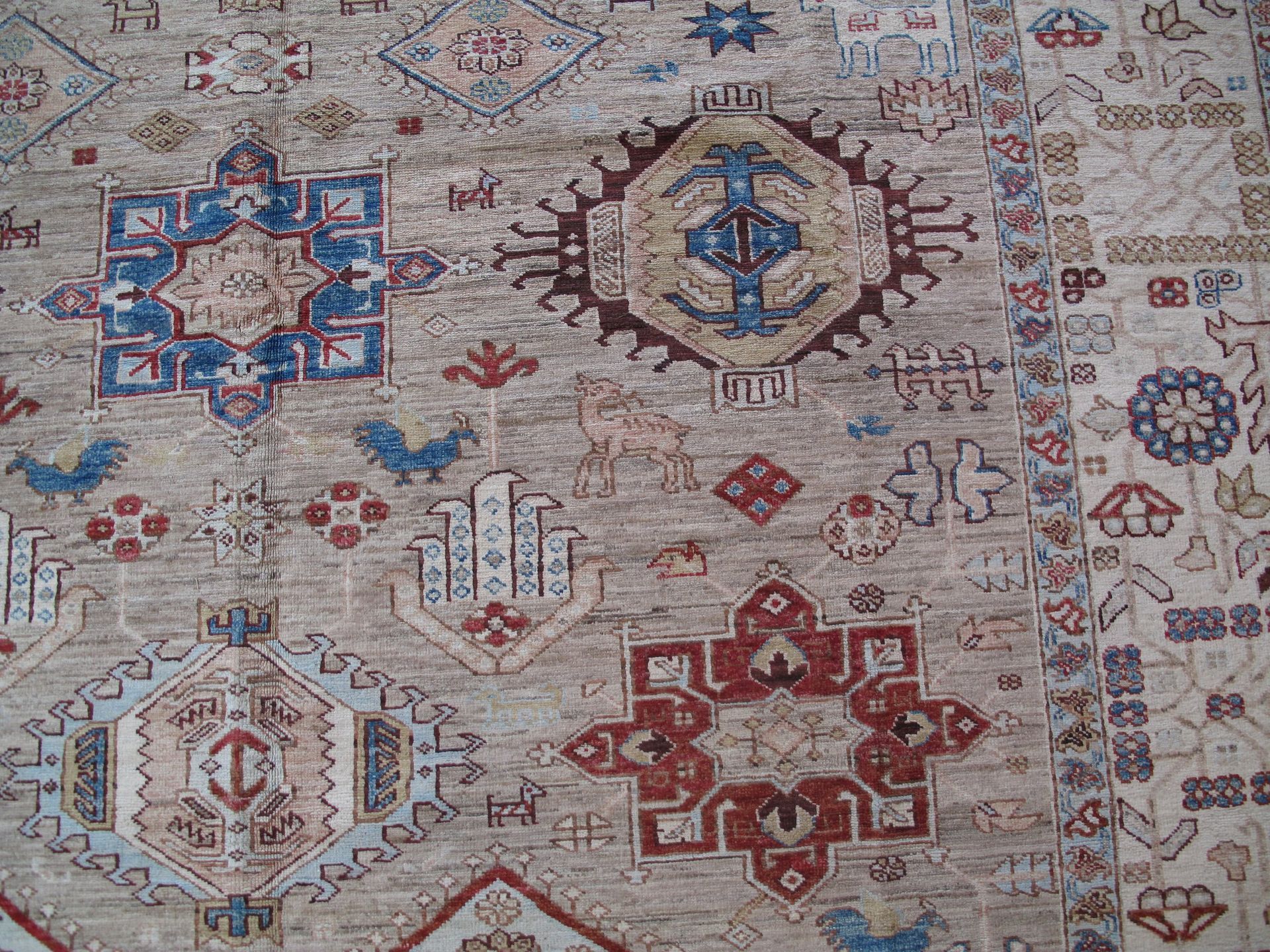 A rug with a pattern on it is on a white background.