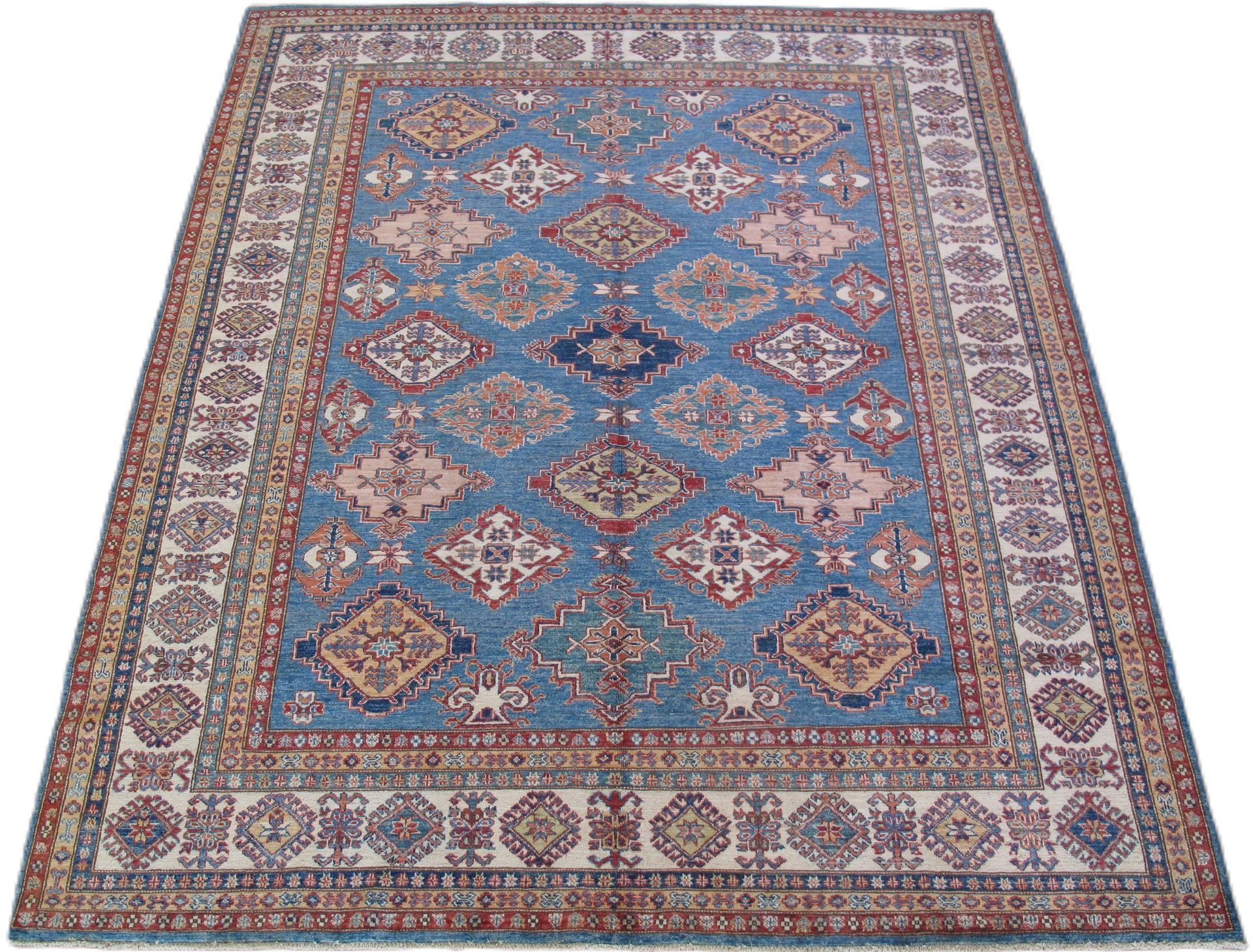 A blue and brown rug with a pattern on it