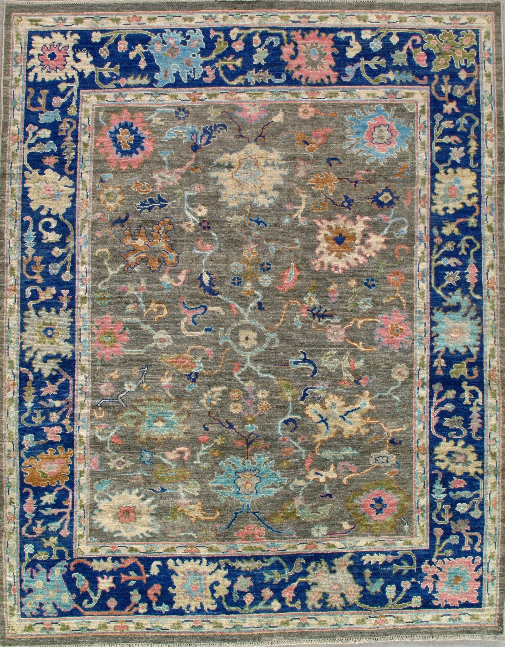 A rug with a blue and pink floral pattern on it.