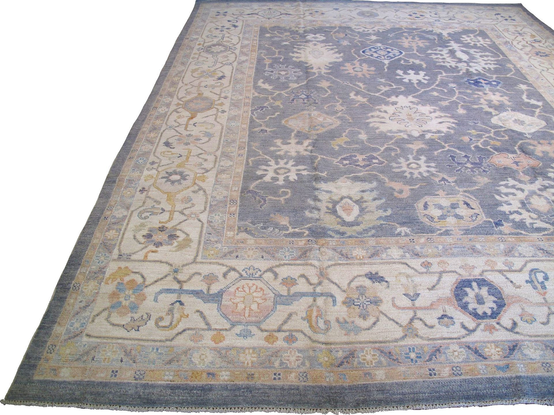 A rug with a floral pattern on it is on a white background