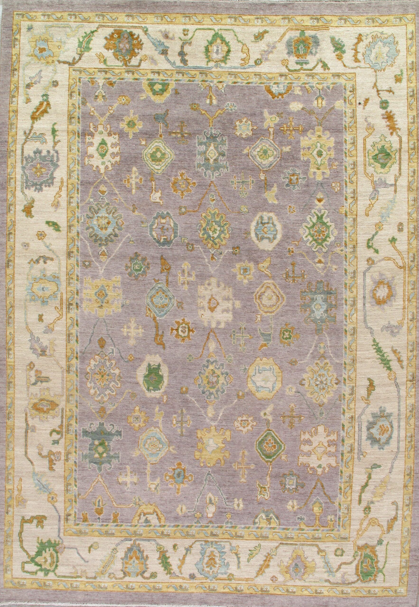 A purple rug with a floral pattern on it