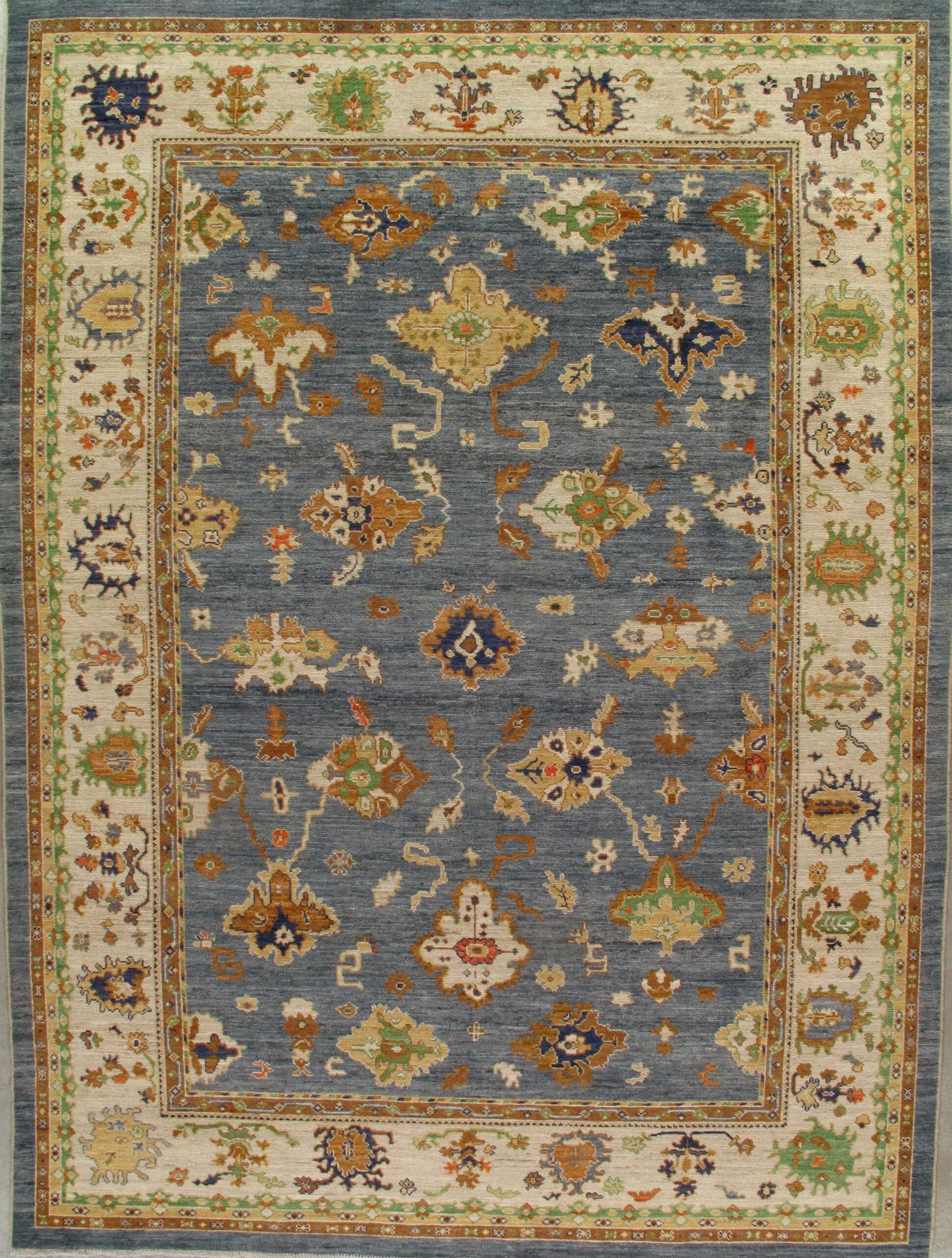 A blue rug with a floral pattern on it