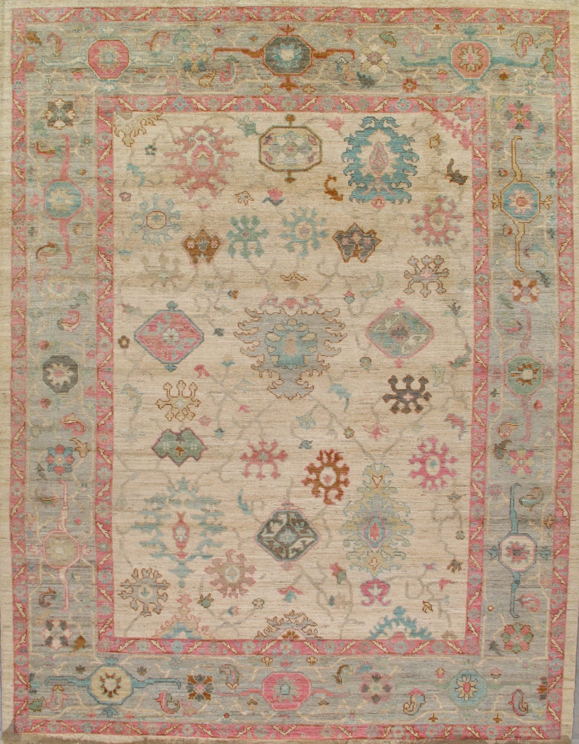 A close up of a rug with a floral pattern on it.