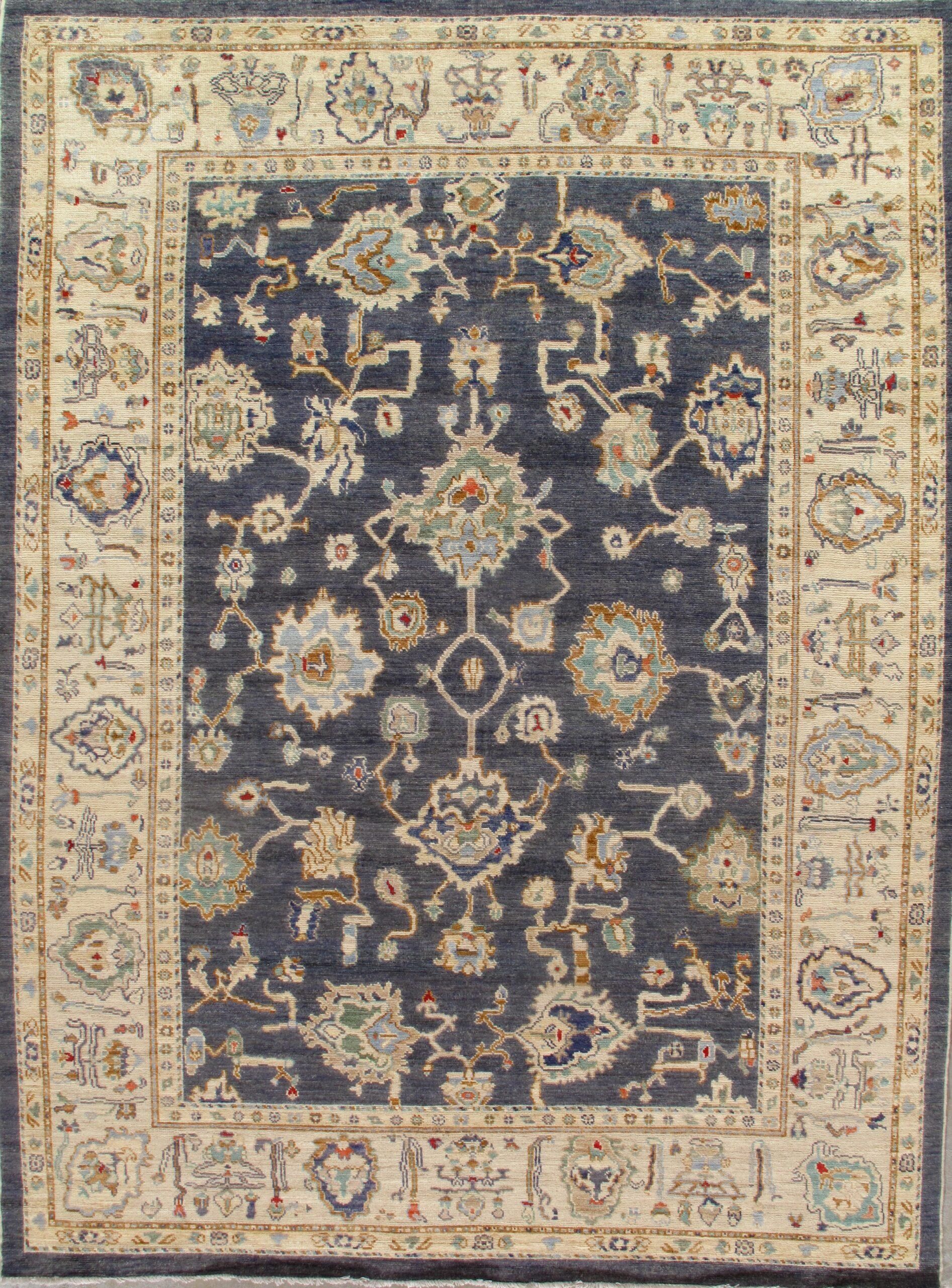 A blue rug with a floral pattern on it