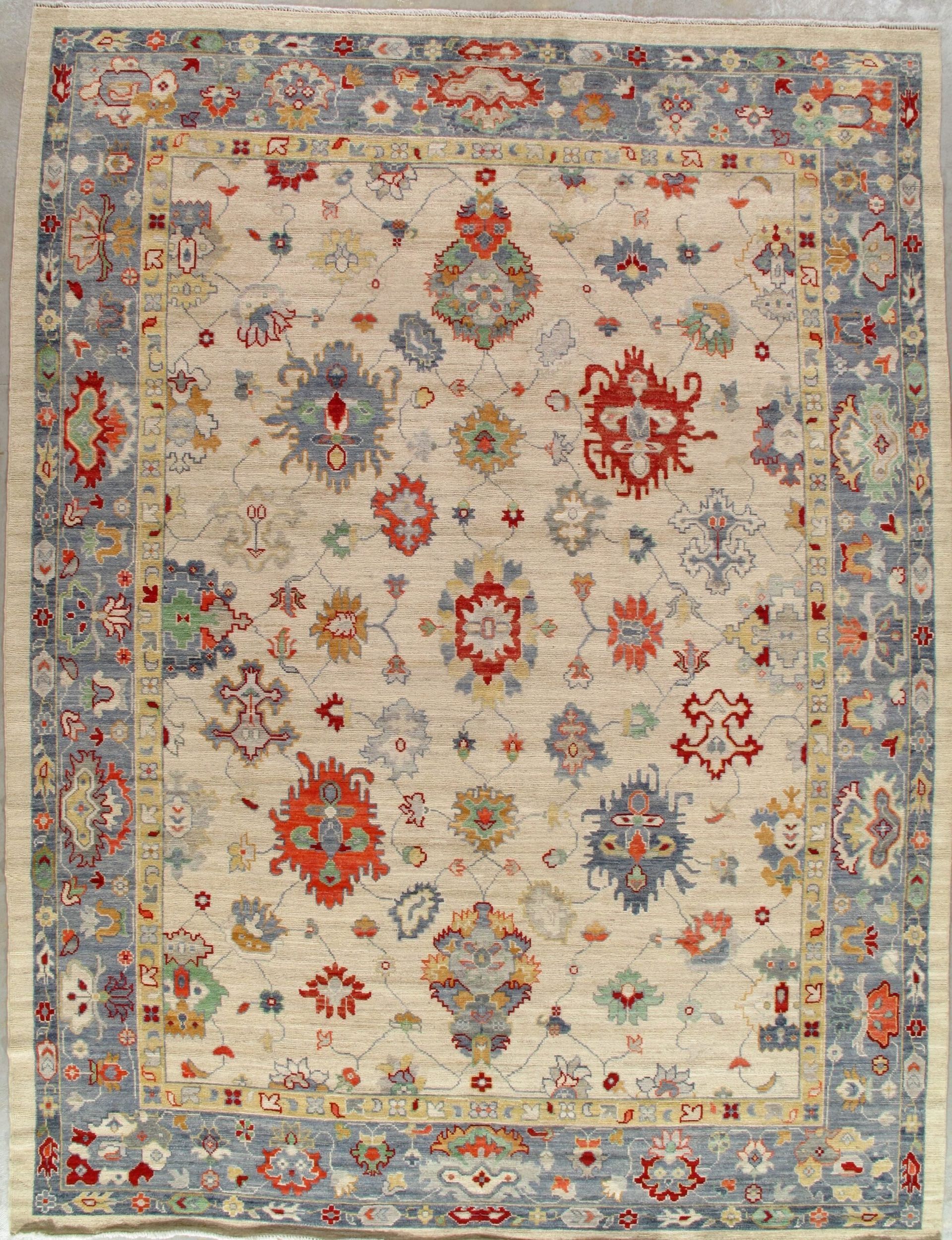 A rug with a floral pattern and a blue border