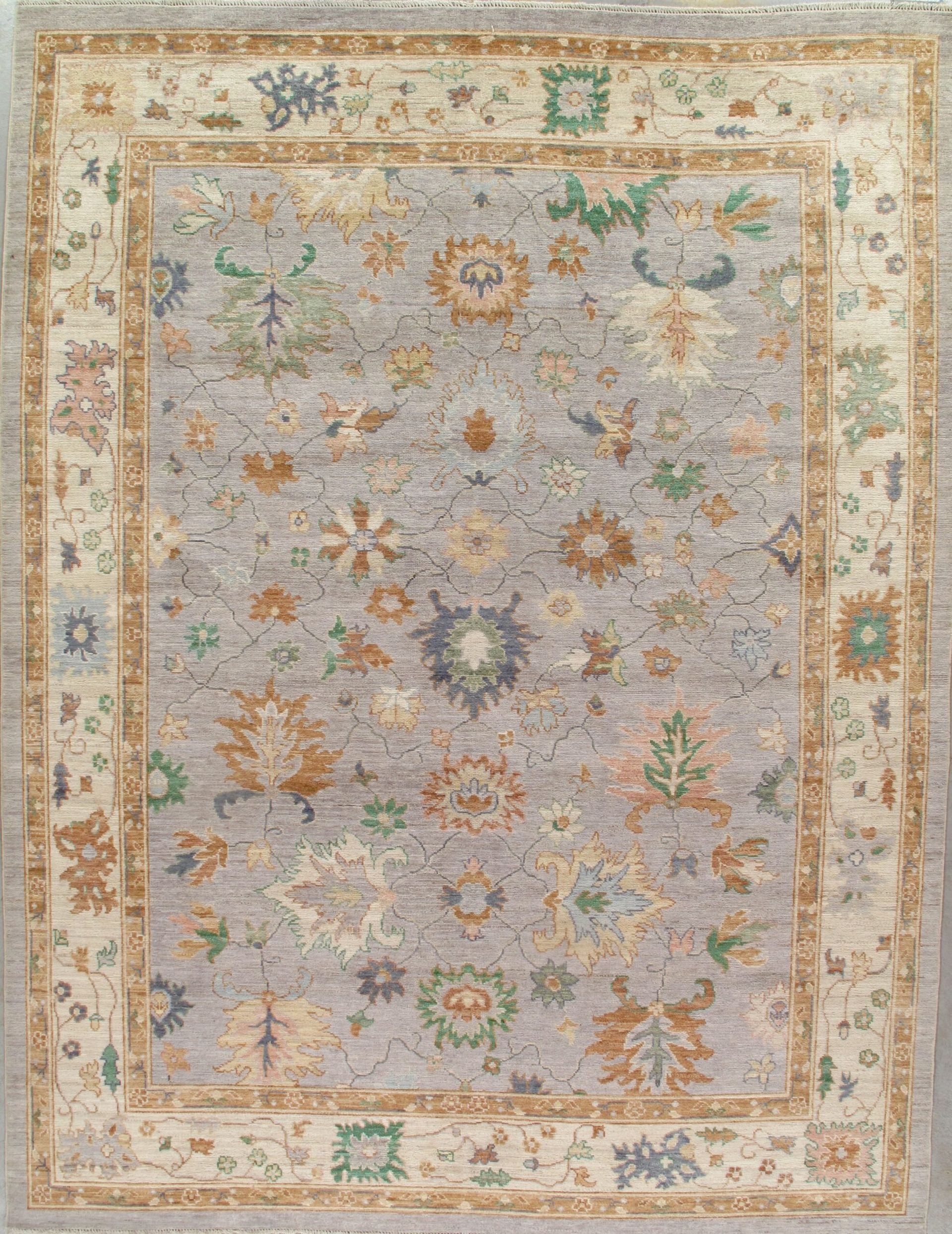 A rug with a floral pattern on it is sitting on a table.
