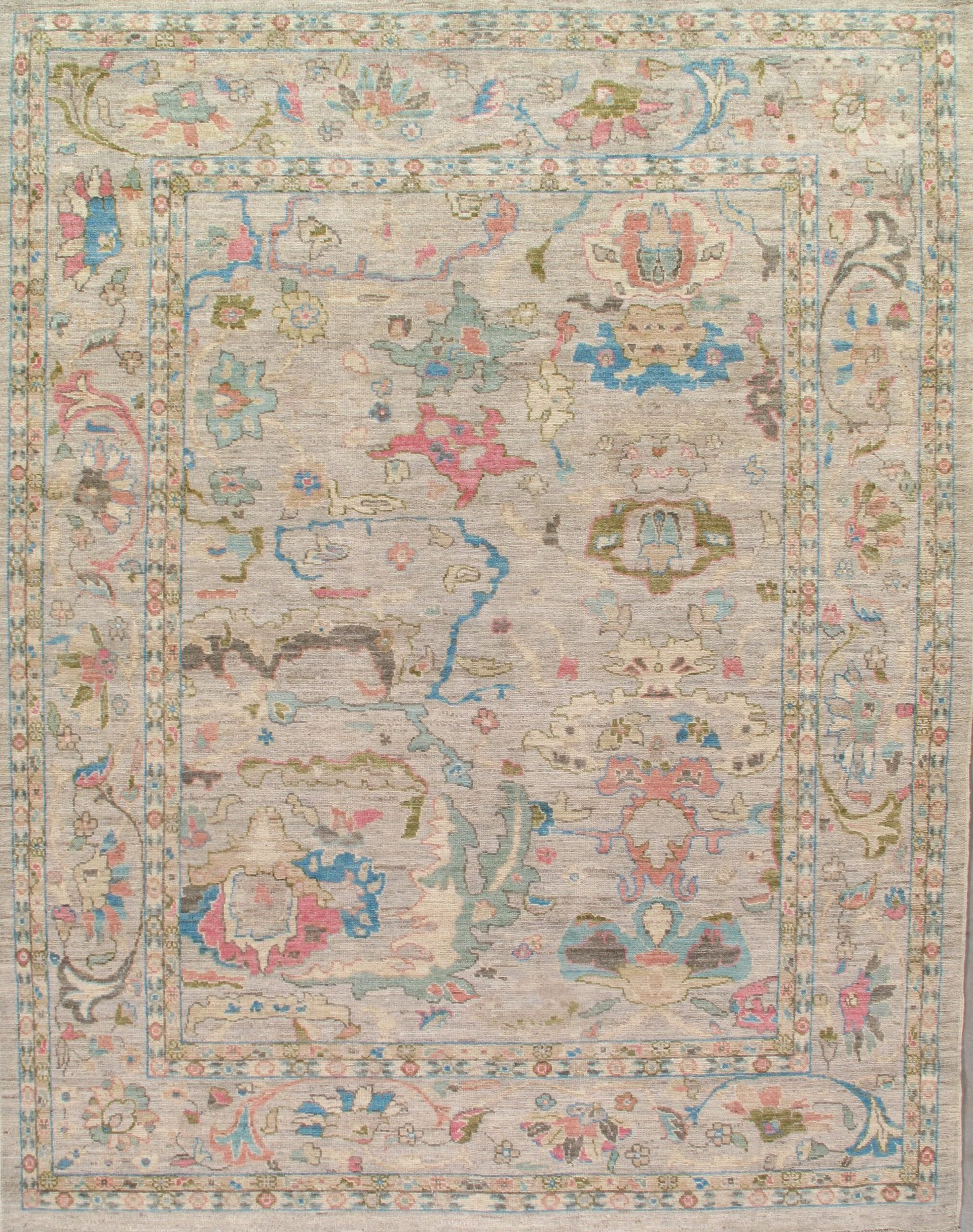 A rug with a floral pattern on it is sitting on a table.